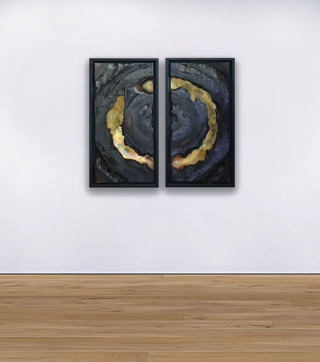 An installation view of the painting 'No Fight Left This Time Around' from 2022 by artist Damian Boylan. The painting from the Fire Paintings series shows carbonised wood and oxidised brass, mounted on a white gallery wall.