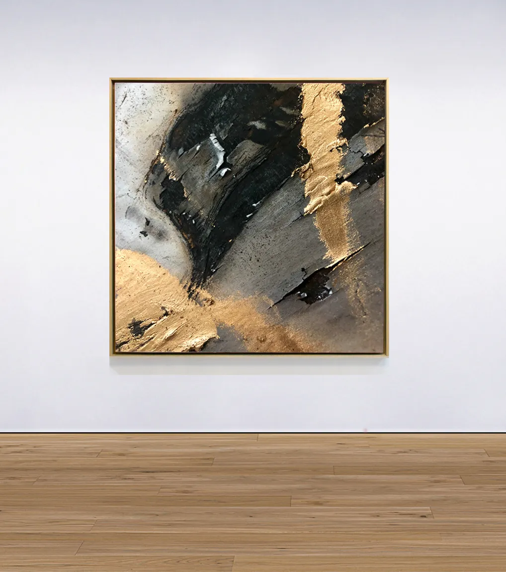 An installation view of the painting 'Sintered' from 2018 by artist Damian Boylan. The painting from the Fire Paintings series shows carbonised wood and gold oil paint, mounted on a white gallery wall.